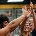 Group celebrating a post-workout achievement